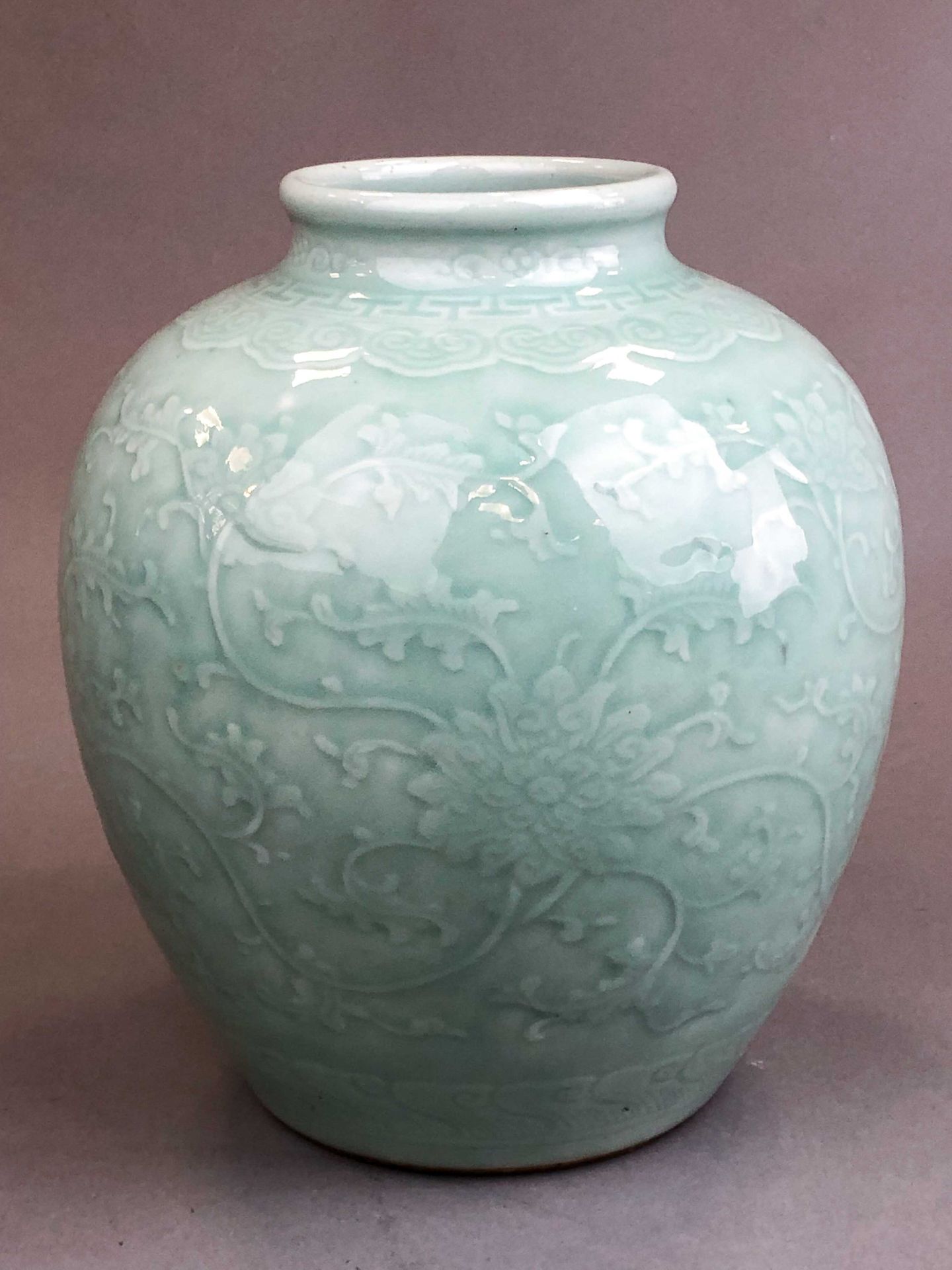 Null *Important ovoid jar in porcelain. The body with a celadon cover is carved &hellip;