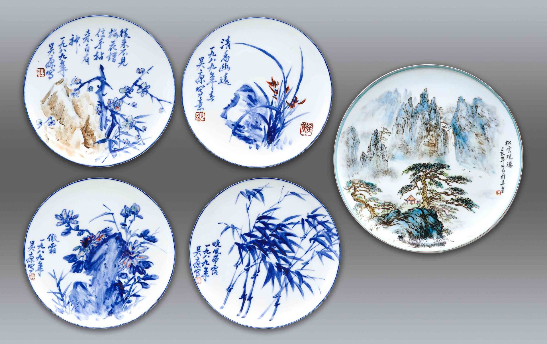 Null Lot comprising (5) : - Set of four plates with vegetal decoration, calligra&hellip;
