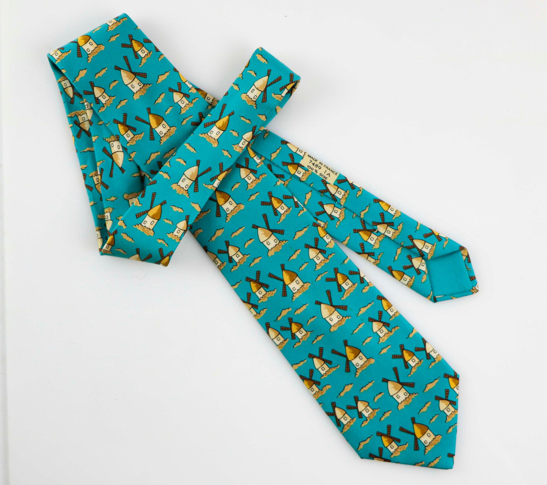 Null HERMES. Multicolored silk tie with windmill decoration