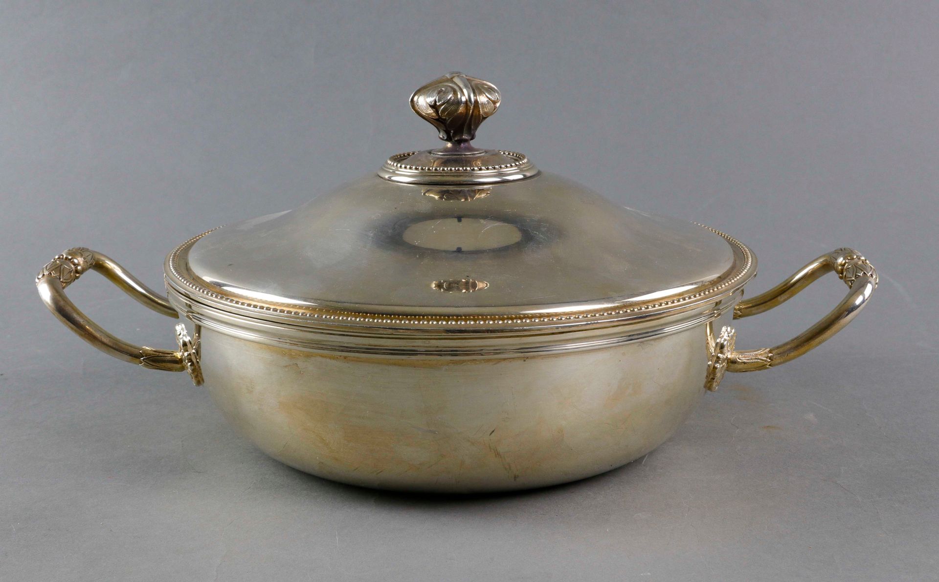 Null CHRISTOFLE. Covered silver metal vegetable dish with Louis XVI decoration o&hellip;