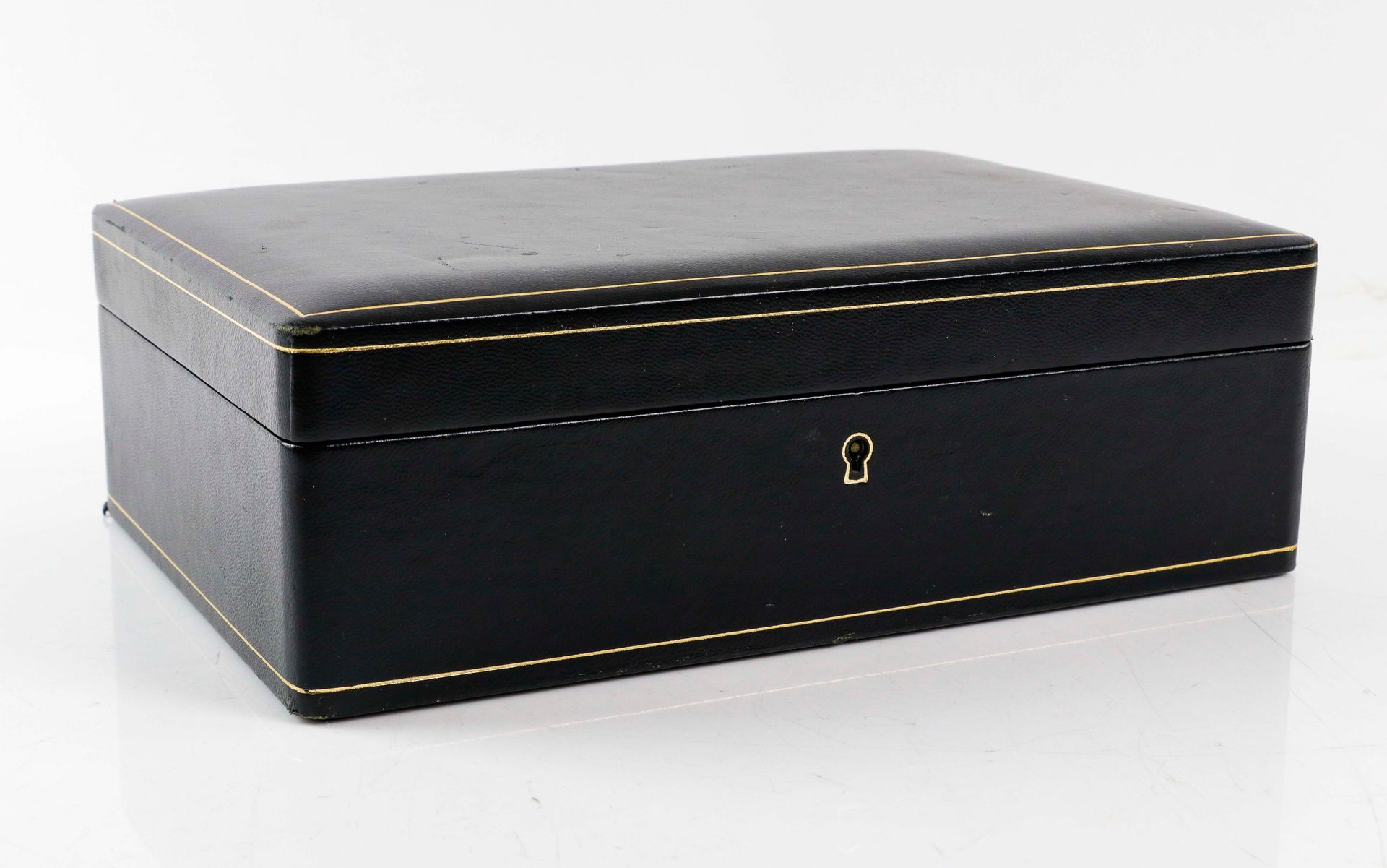 LANCEL. Leather covered jewelry box with gold piping Suede interior with shelf.