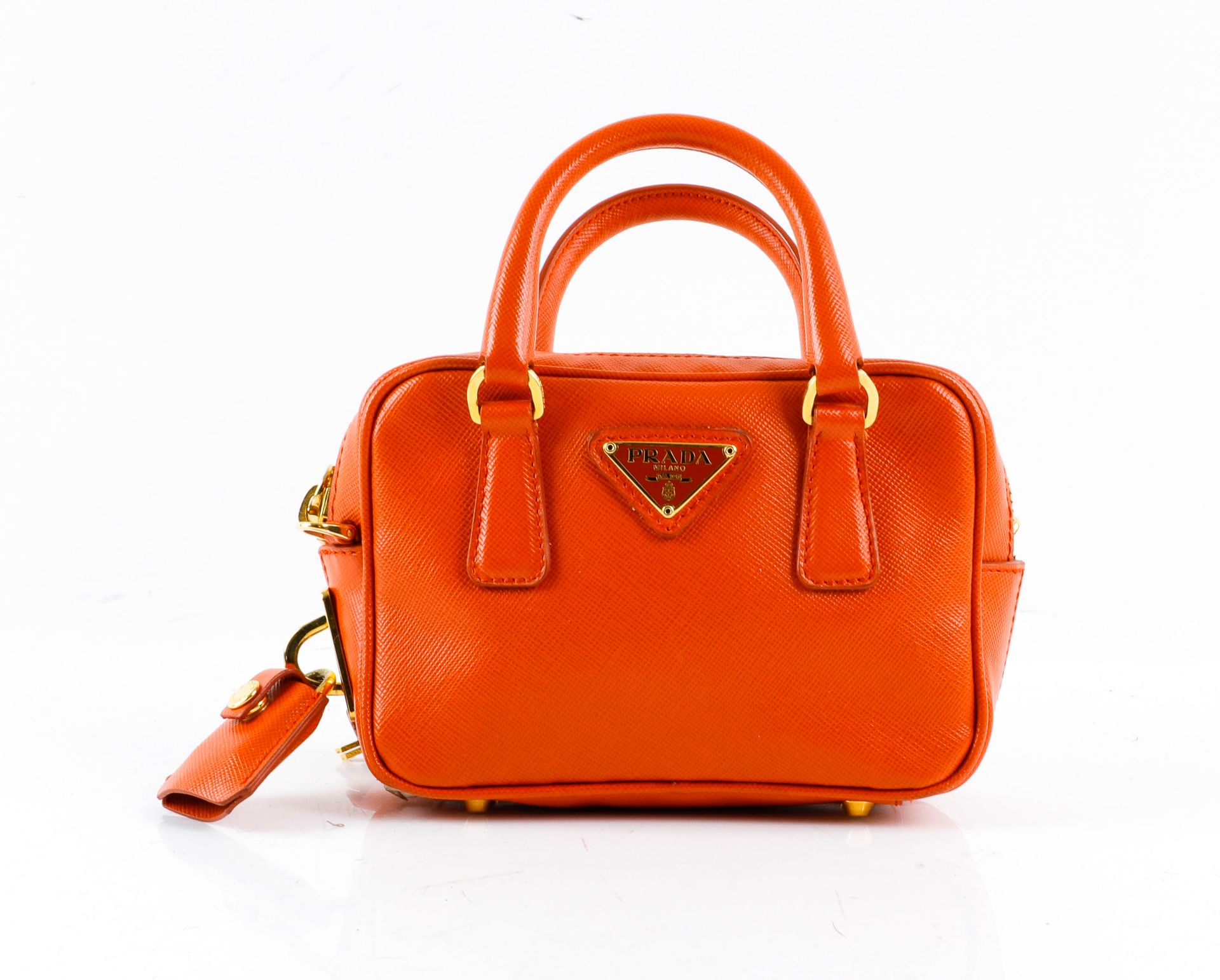 Null PRADA. Evening bag in orange leather. Zipper closure - Double handle. Remov&hellip;