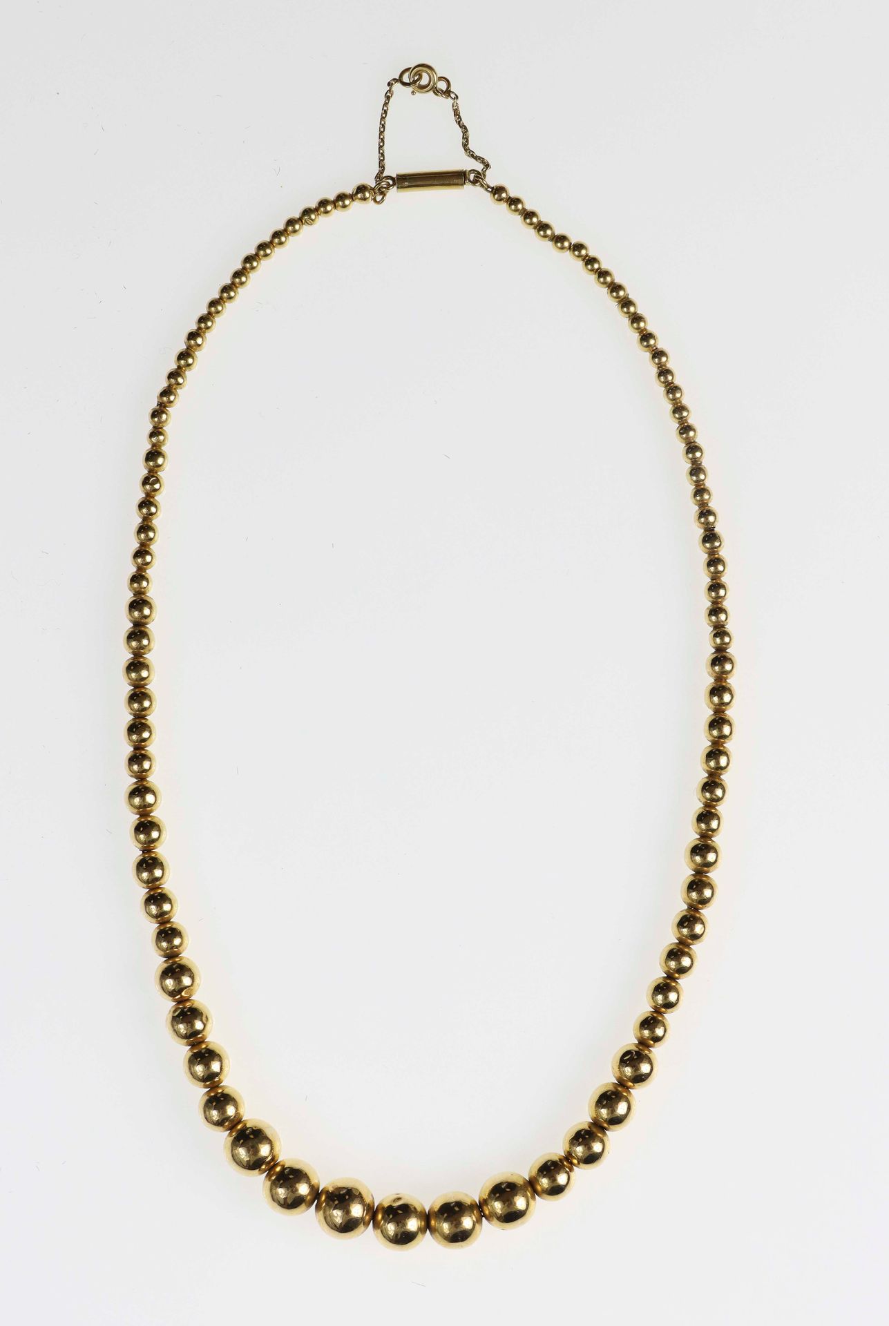 Null Goldene Halskette aus fallenden Perlen. Mit einer Sicherheitskette. 14,8 g