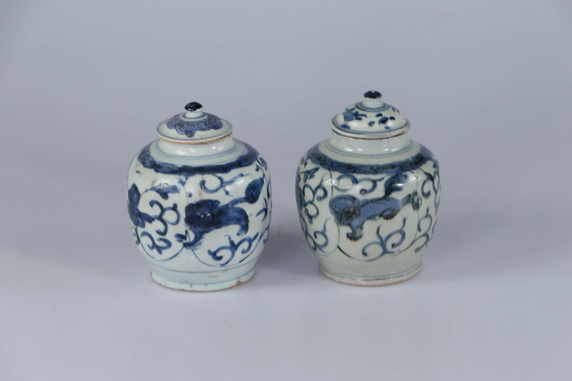 Null (2) CHINA, Ming Dynasty. Pair of porcelain covered potiches decorated in co&hellip;