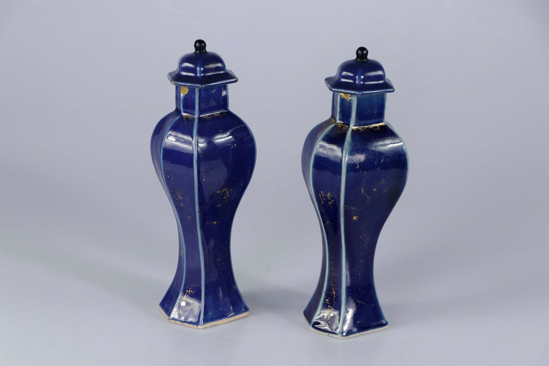 Null (2) CHINA, Kangxi period. Two square-section vases, covered with powder-blu&hellip;