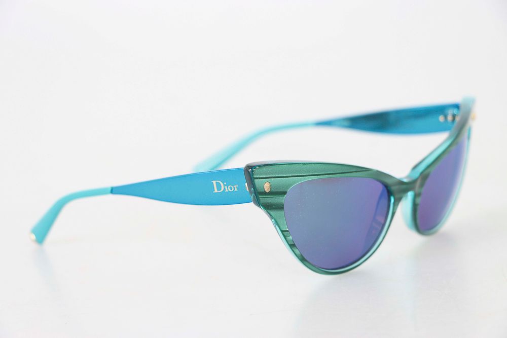 Null Christian DIOR. Pair of sunglasses. In their case