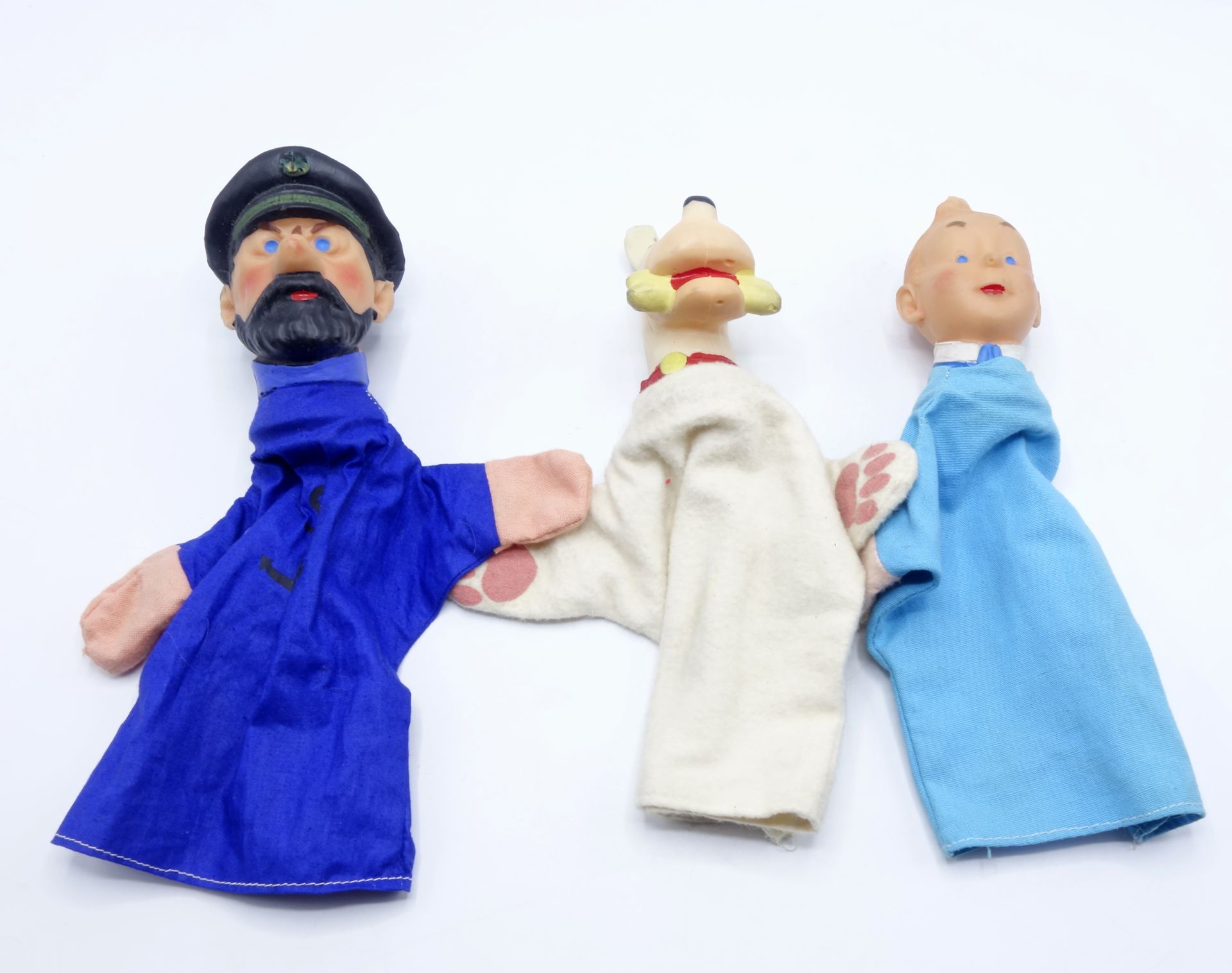 HERGÉ 
Set of 3 puppets from the 60s, Tintin, Snowy and Captain Haddock.