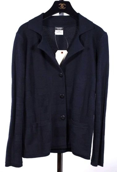 Null CHANEL UNIFORM - CARDIGAN in blue cotton closed by three buttons, two pocke&hellip;