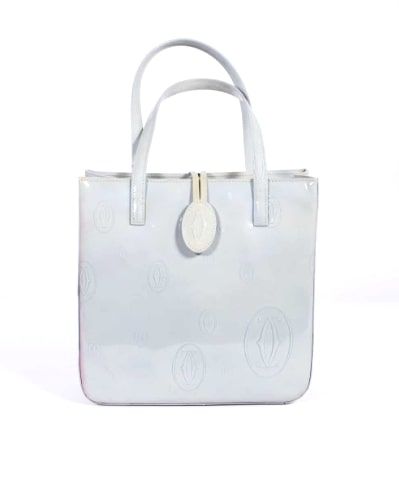 Null CARTIER - Sky blue patent leather bag with embossed logos. Dimensions: 20 x&hellip;