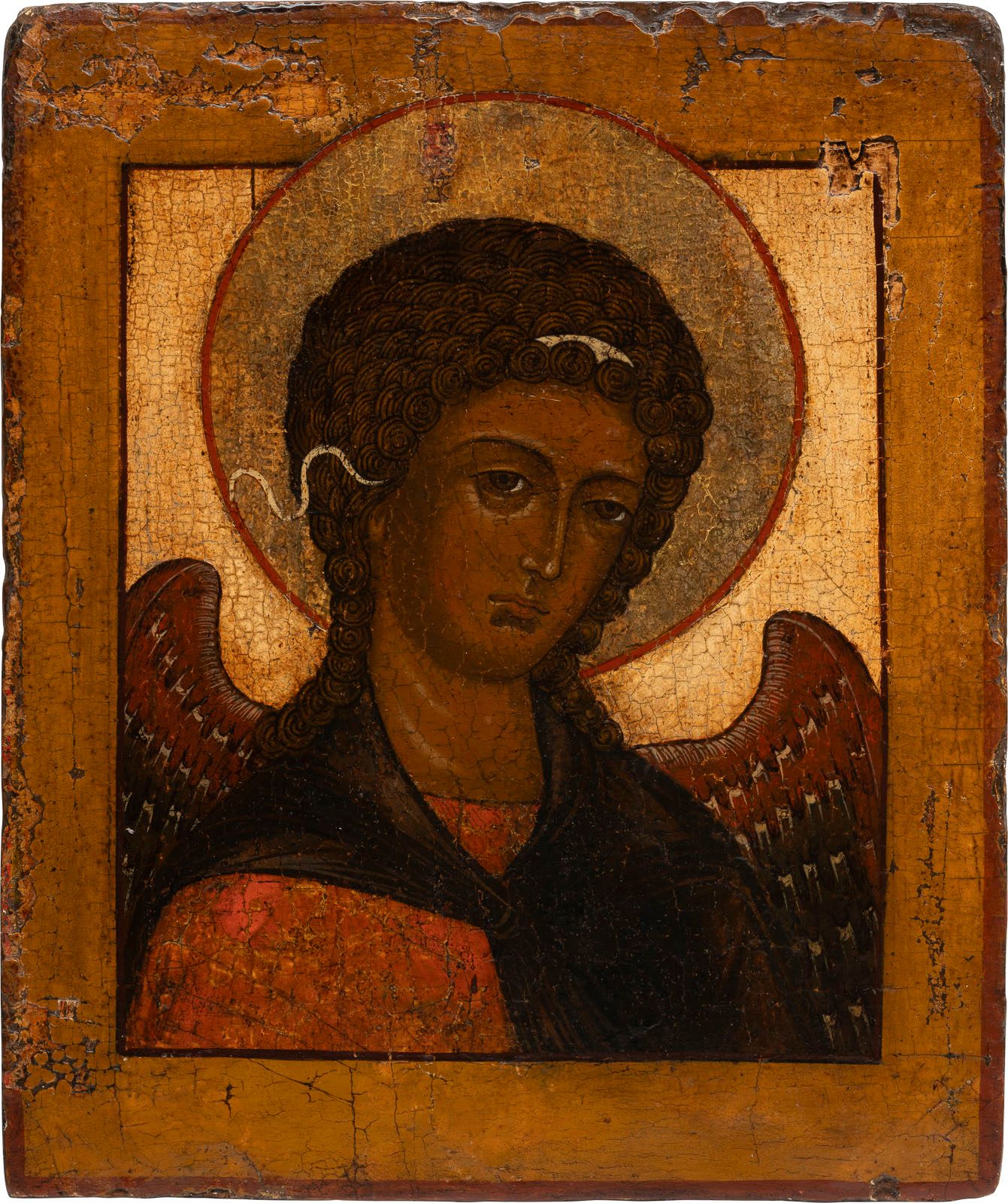 AN ICON SHOWING THE ARCHANGEL MICHAEL FROM A DEISIS 俄罗斯，18世纪，木板上的淡彩画，显示出米歇尔天使的形象&hellip;