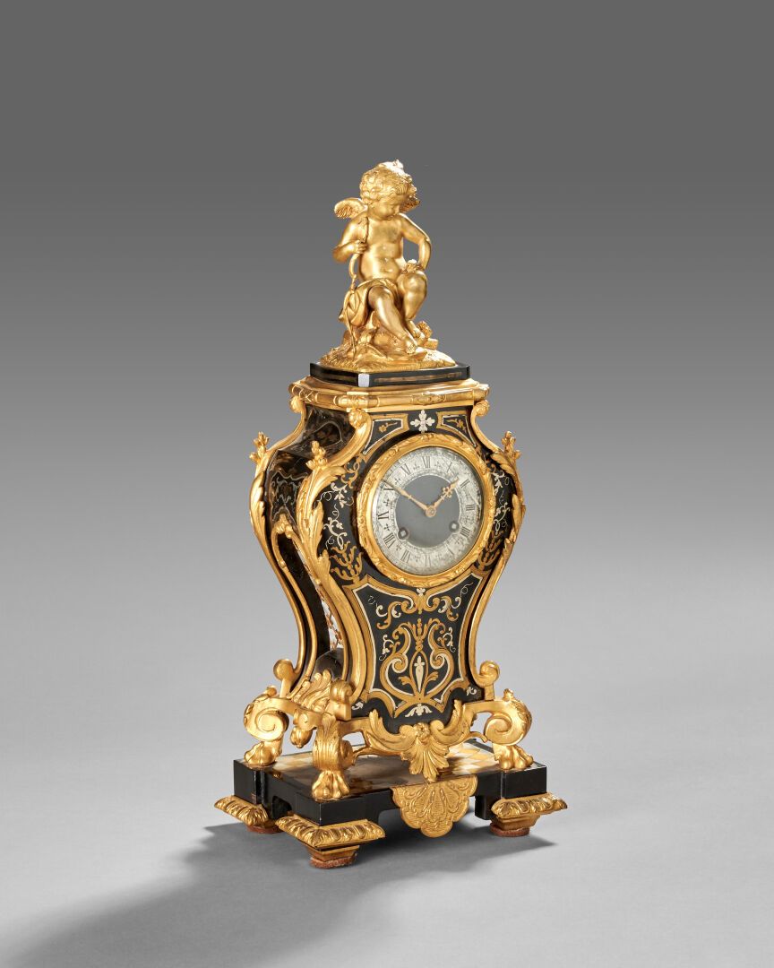 Null Cartel or clock in gilt bronze and blackened wood.
Decorated with a Boulle &hellip;