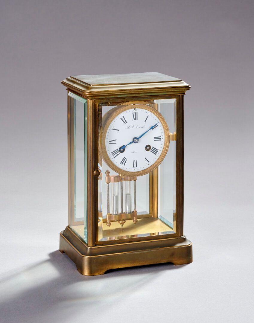 Null A.H. RODANET à Paris
Pendule "cage" en bronze ou laiton doré et verre.
Cadr&hellip;
