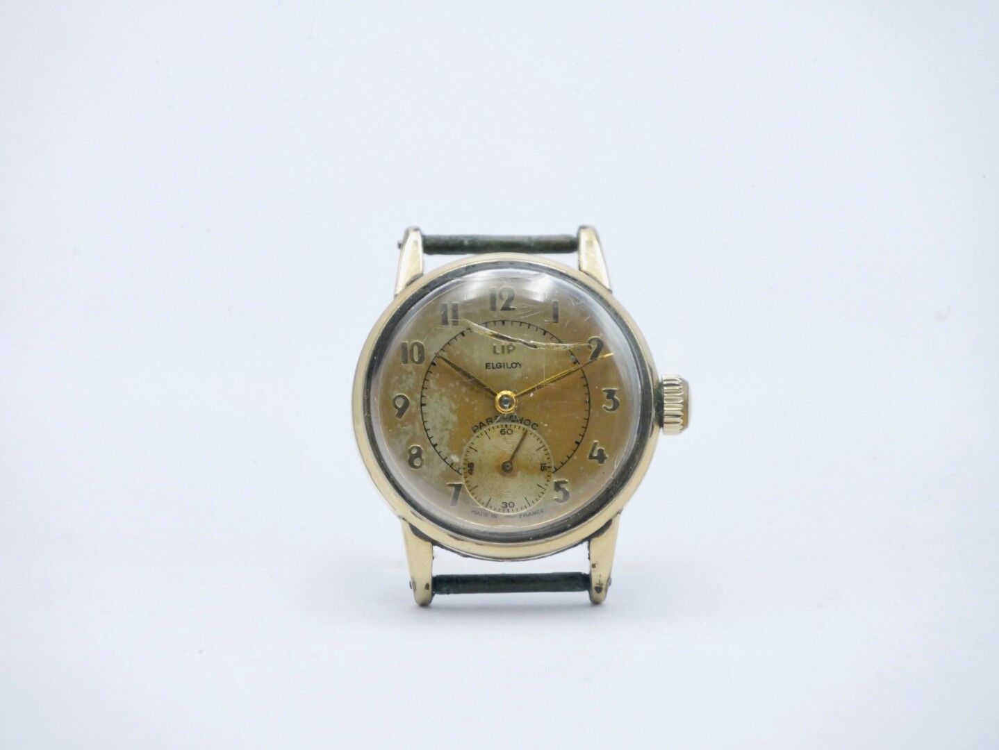 Null LIP Elgiloy - About 1950 

Gold-plated metal case, dial with Arabic numeral&hellip;