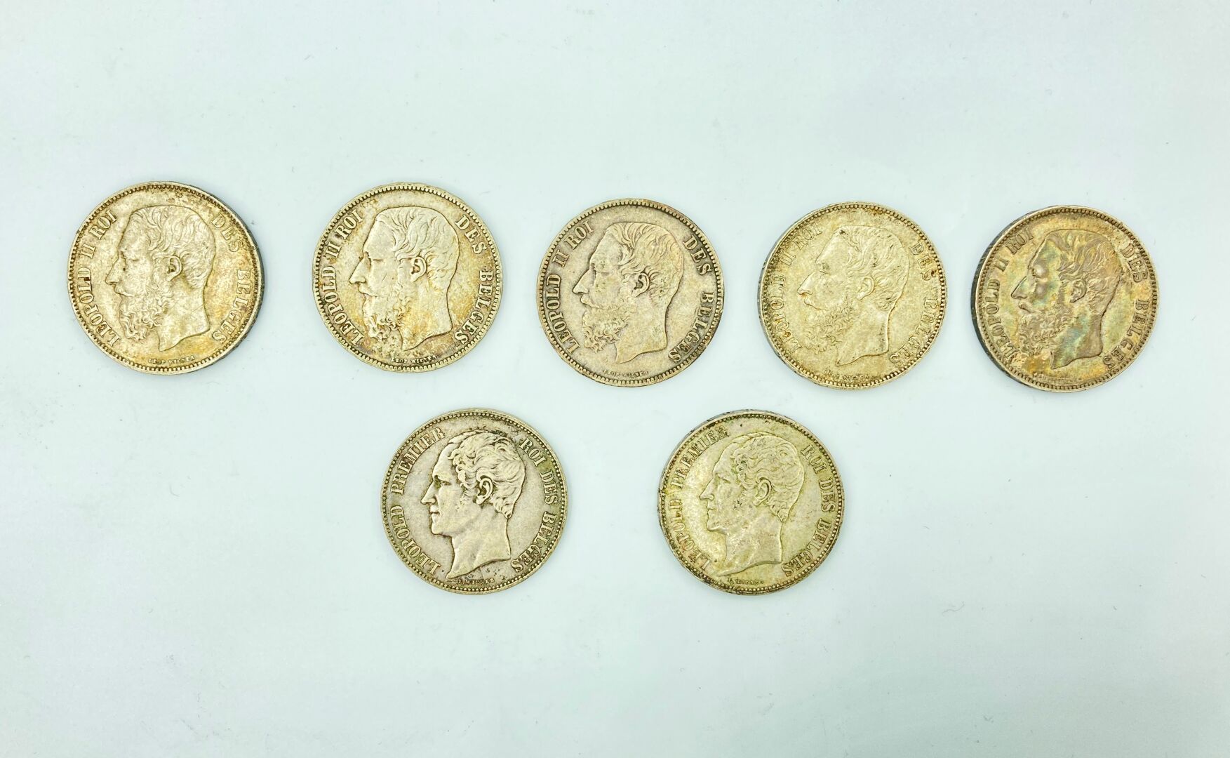 Null BELGIQUE - XIXe et XXe siècle 

Lot de sept pièces de 5 francs en argent : &hellip;