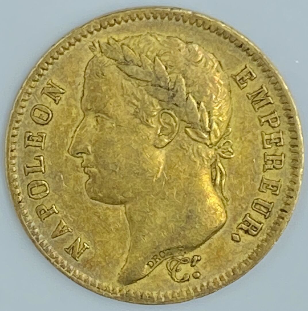Null 法国--第一帝国

40法郎金币，拿破仑头像桂冠，由德罗兹制作。F，1812年，巴黎（Atelier A）。

重量：12.8克。

穿着