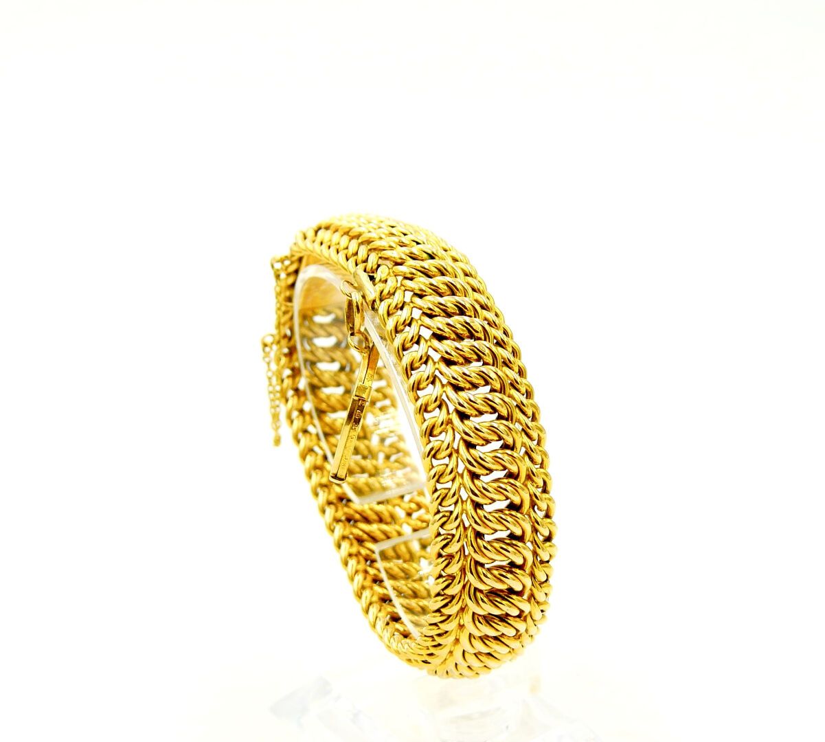 Null 20th CENTURY 

Yellow gold bracelet 750/1000e with flexible twisted mesh ho&hellip;