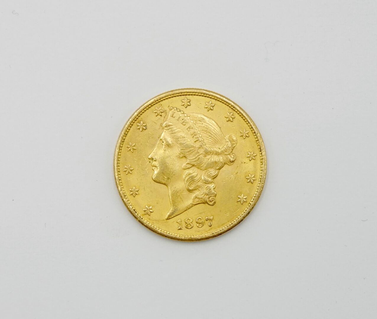 Null UNITED STATES 

20 dollars gold Liberty coin 1897 

Weight : 33,4 g. 



Go&hellip;