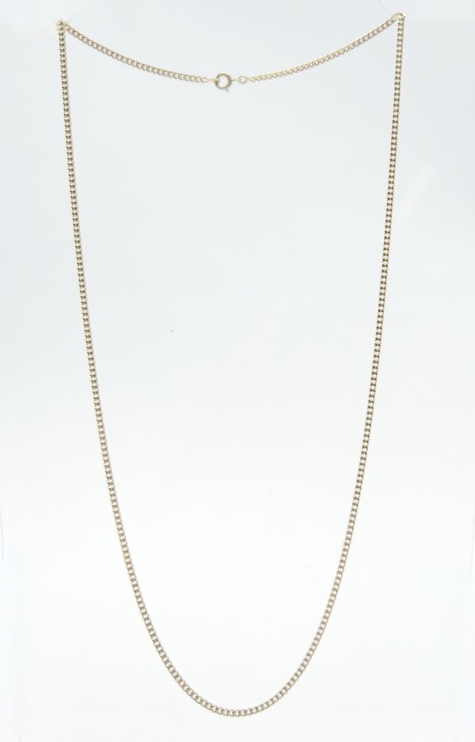 Null 20th CENTURY 

Gold chain 750/1000e, lobster clasp 

Weight : 13,6 g. 

L. &hellip;