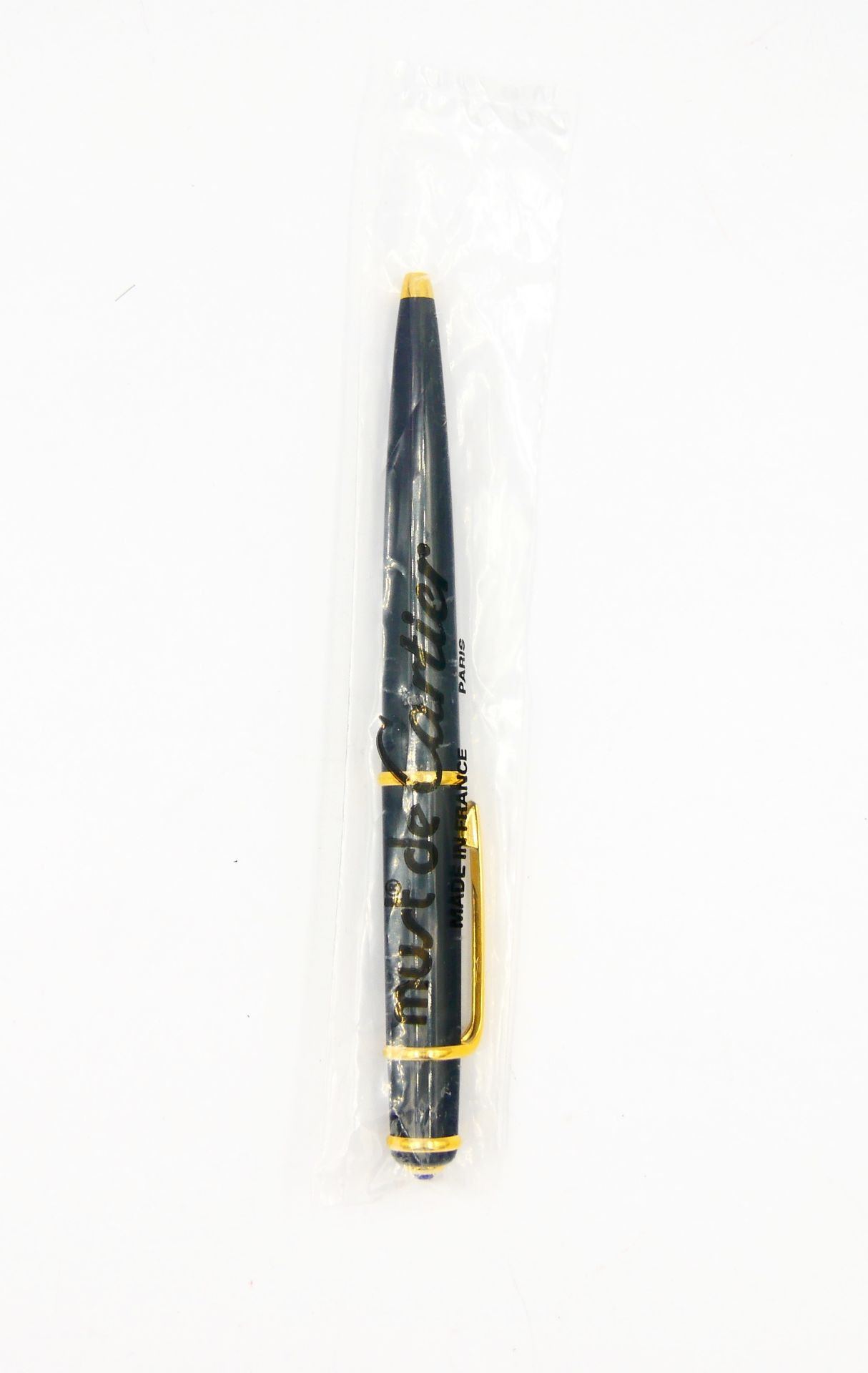 Null CARTIER 

Diabolo 

Composite black and gold metal ballpoint pen, blue cabo&hellip;