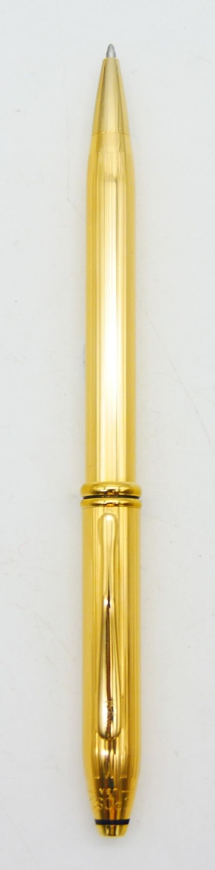 Null 横向

汤森

带凹槽的镀金圆珠笔管

刻有十字架的美国

长：15厘米，6英寸。

文件，箱和过箱



状况良好