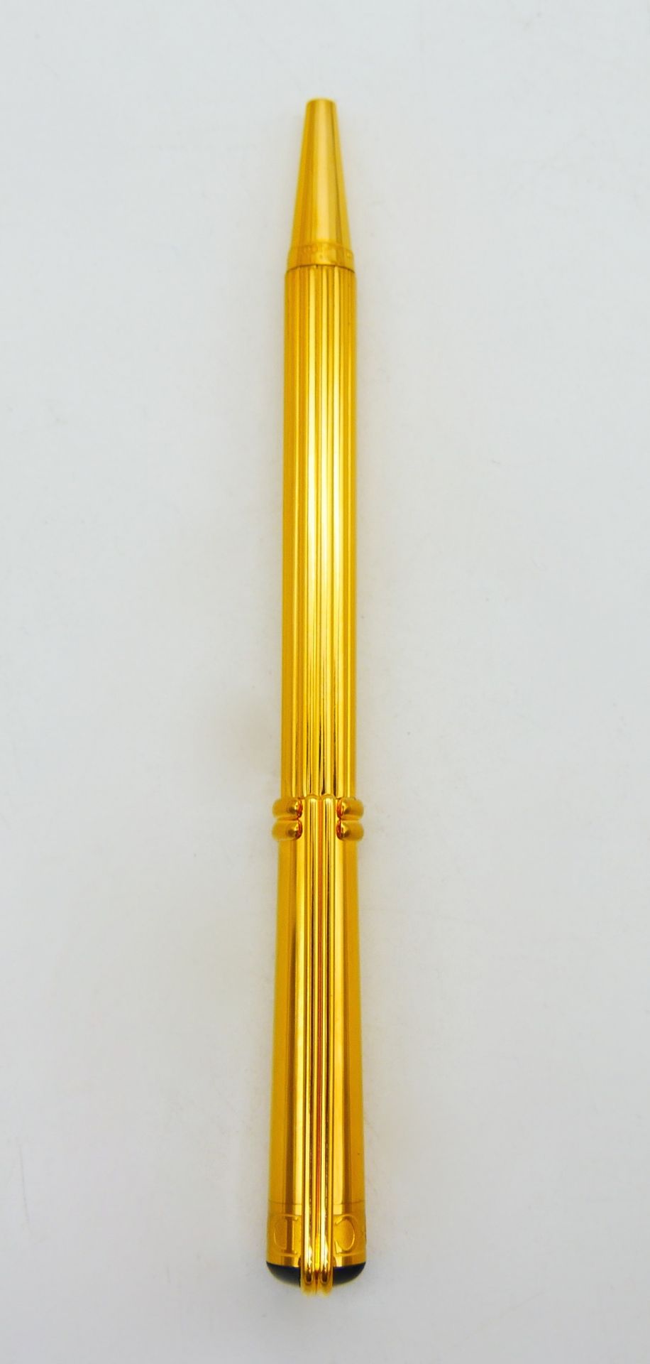 Null 克里斯蒂安-迪奥

镀金和普通金属的Biros

刻有Christian Dior Paris的字样

长：13.5厘米，5.2英寸。

箱子和外箱
&hellip;