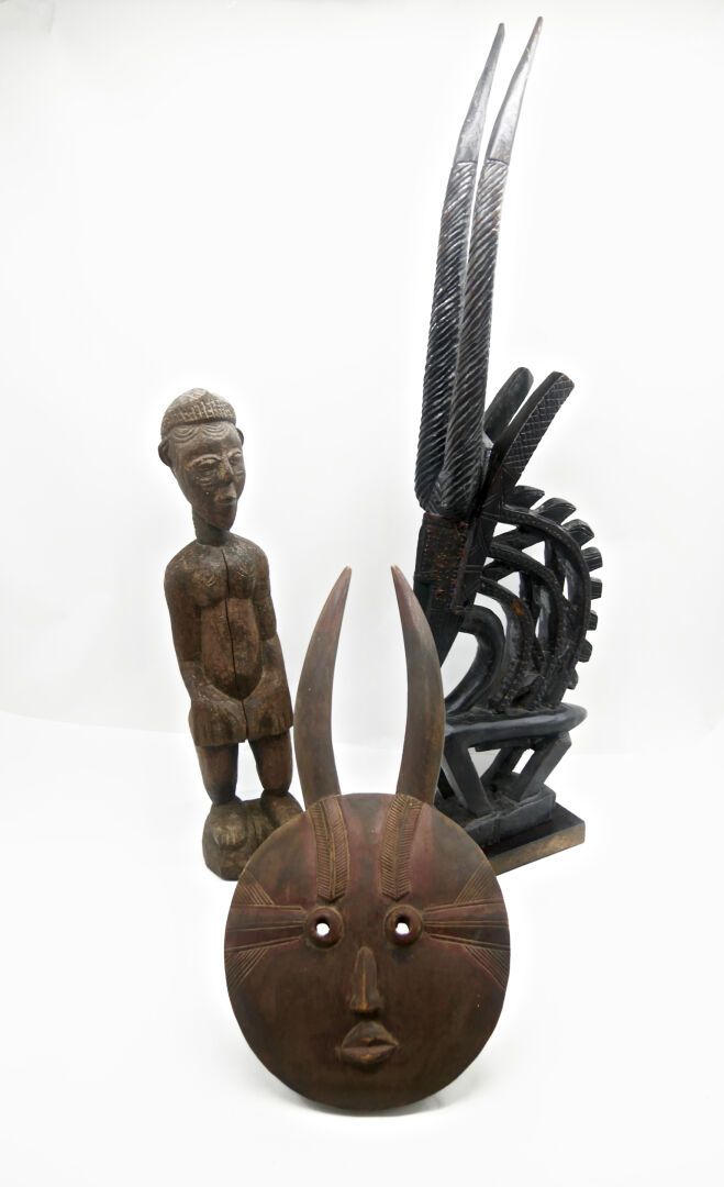 Null AFRICA

Set of 3 wooden sculptures including a mask showing a circular face&hellip;