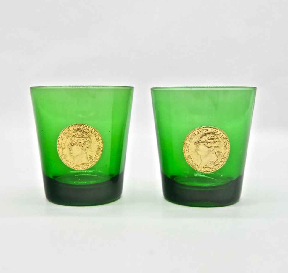 Null DUBONNET

Two green glass glasses decorated with golden medallions, one wit&hellip;