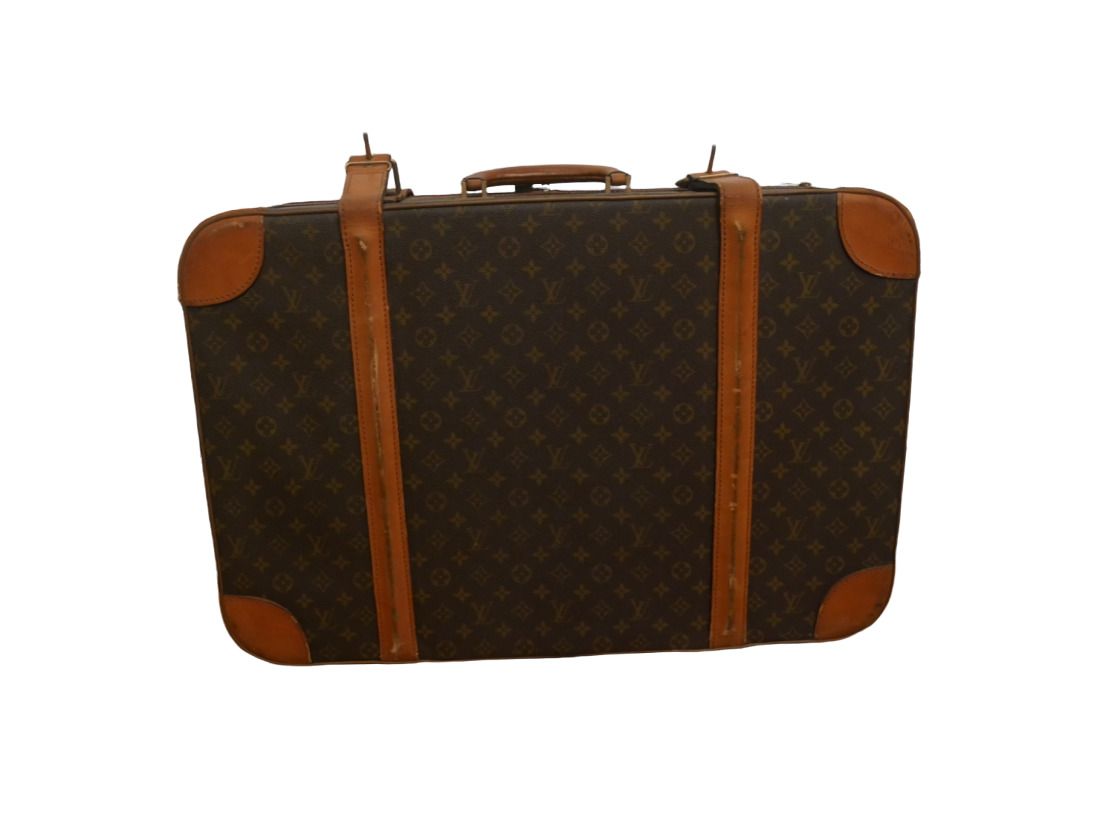 Null Louis VUITTON

Monogram帆布和天然皮革的手提箱，有一个把手，由两条带子和两个拉链关闭，内部有奶油色的织物衬里，有两条带子和两个夹&hellip;