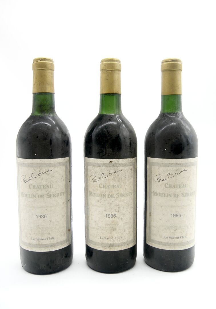 Null 莫林-德-塞雷特城堡（Chateau Moulin de Serret

1986年保罗-博古斯签名的塞雷特酒庄3瓶

1瓶很高的酒肩和2瓶高酒肩

&hellip;