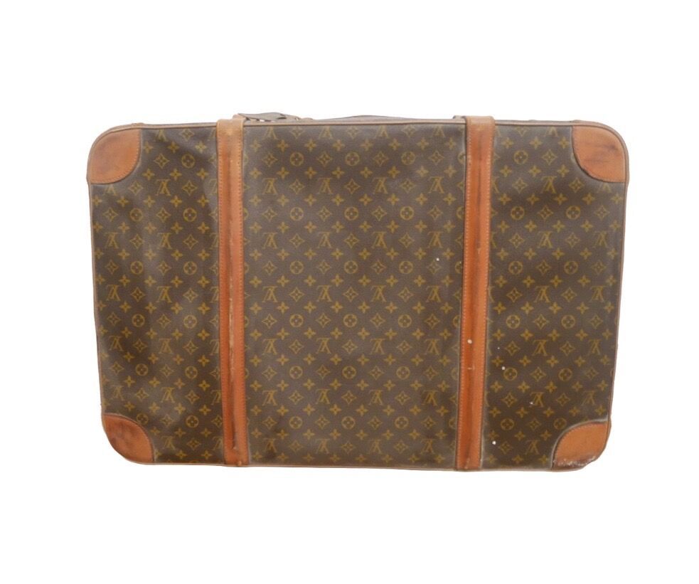 Null Louis VUITTON

Suitcase in Monogram canvas and natural leather, provided wi&hellip;