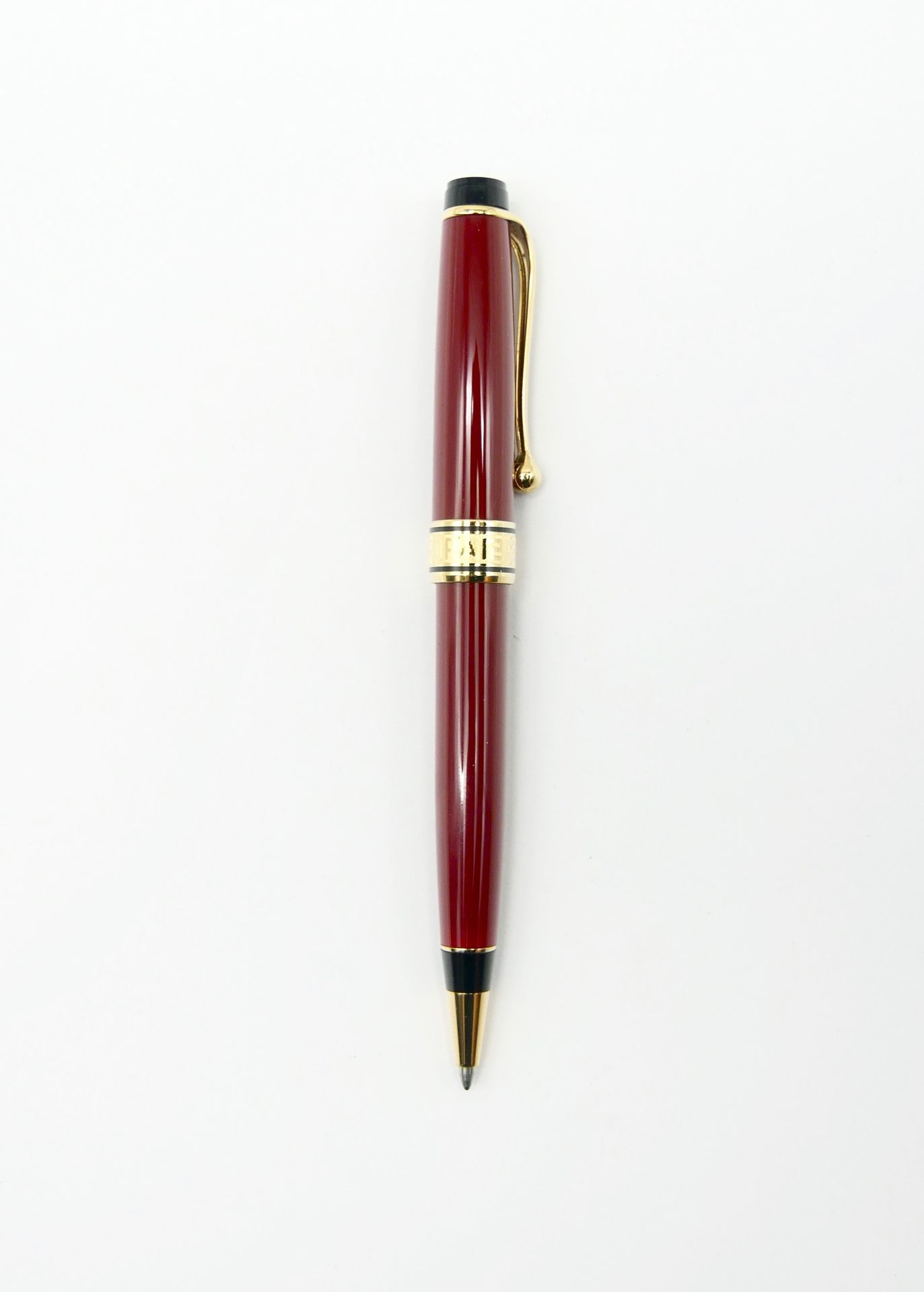 Null AURORA 

Optima 

Ballpoint pen in red resin and gilded metal with engraved&hellip;