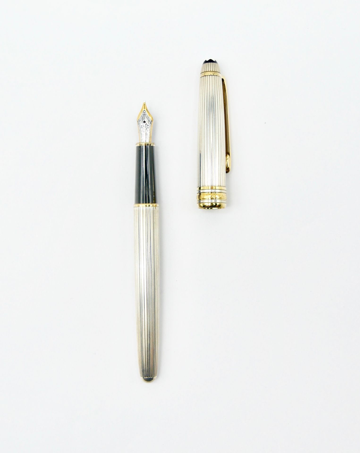 Null 蒙特布朗

大师之路》(Meisterstück)

单人纸牌天赋164

钢笔，银色925/1000，金色750/1000笔尖，经典款

编号为ED&hellip;