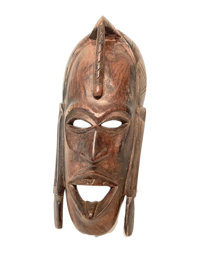 Null ÁFRICA 
Máscara de tipo africano
Madera con pátina negra-marrón
H. 21 cm. 8&hellip;