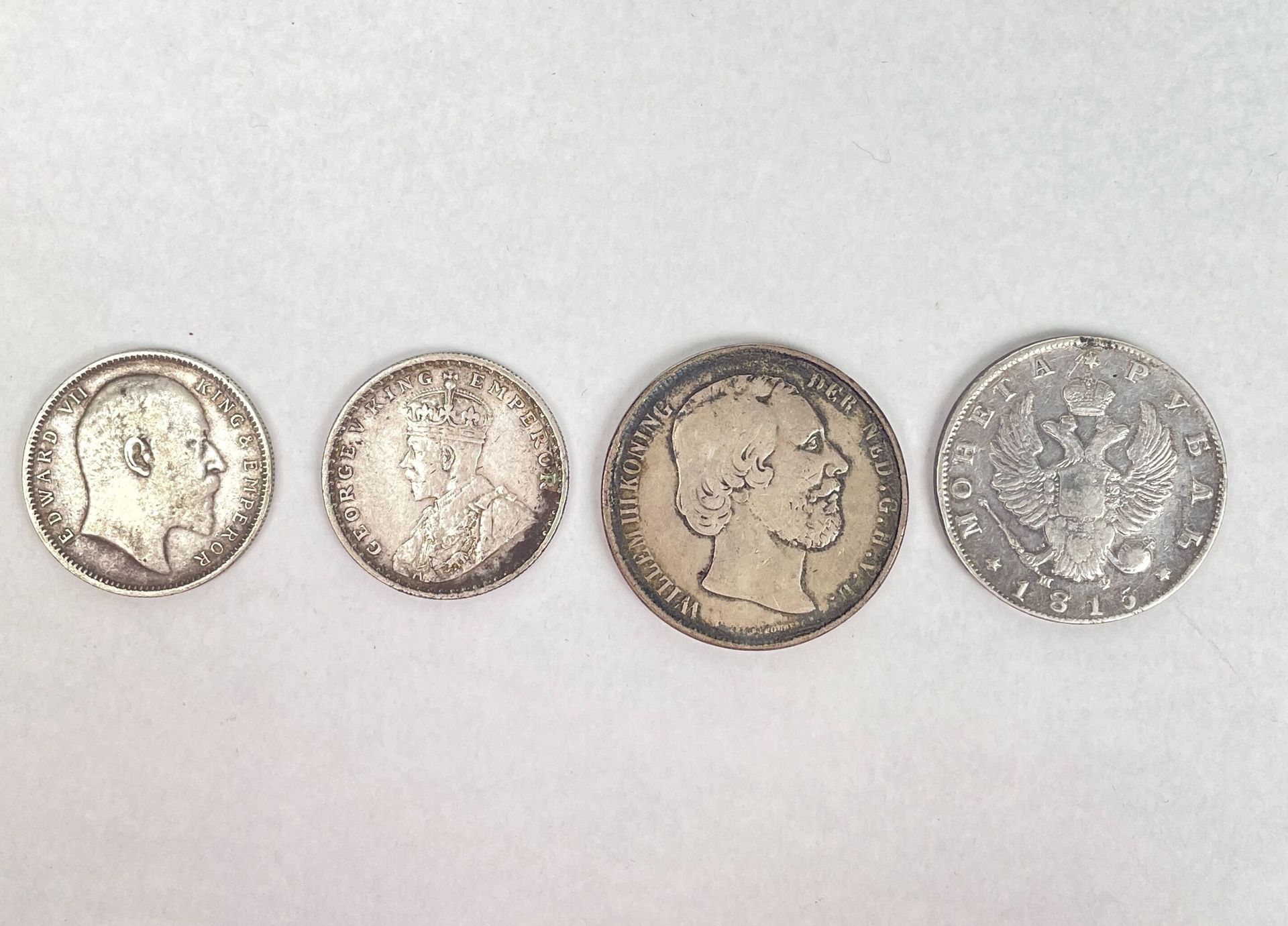 Null 俄罗斯 - 印度 - 荷兰 - 19和20世纪 
四枚银币：
- 俄罗斯。1枚1卢布双头鹰硬币，868/1000银币，1815年。重量：20.8 克。&hellip;