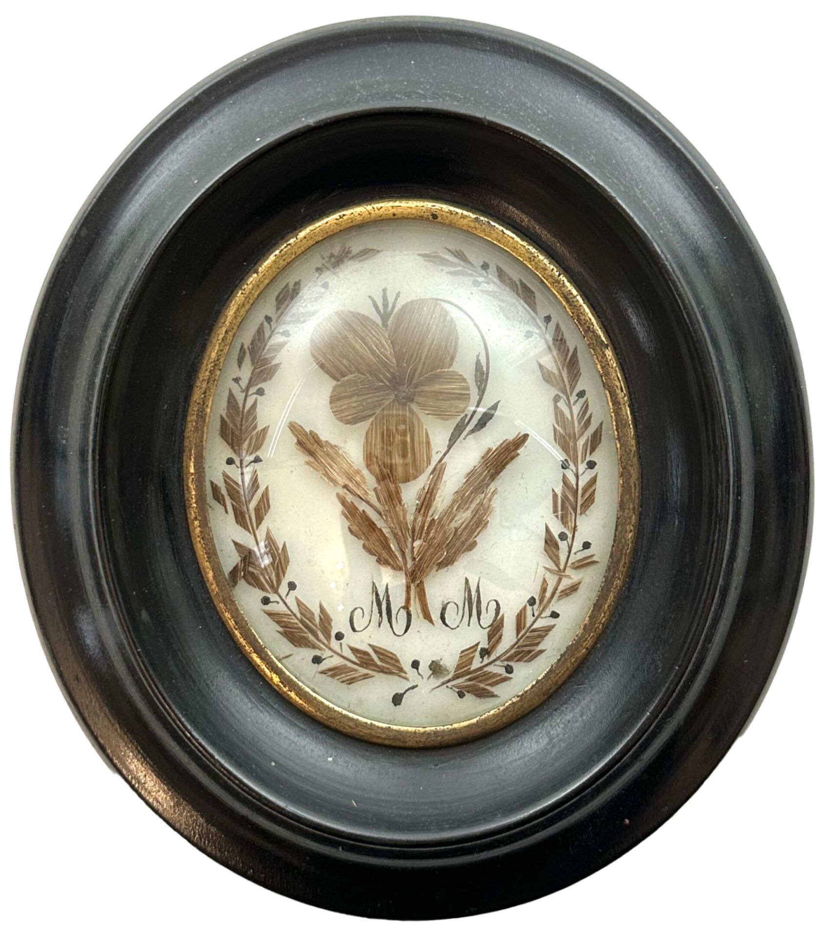 Null late 19th - early 20th century
Hair medallion with MM number and pansy in a&hellip;