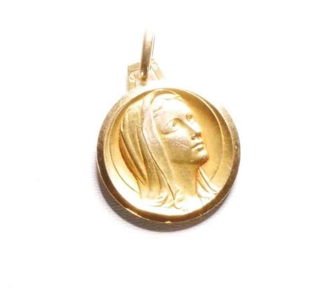 Null Médaille ronde en pendentif en en or 750/1000e représentant la vierge Marie&hellip;