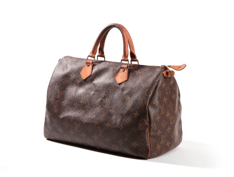 Louis VUITTON Speedy 35 travel bag in monogram coated c…