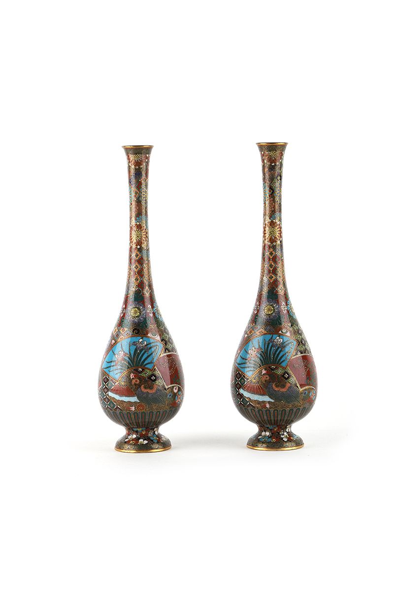 Null JAPAN , 19th century

A pair of cloisonné vases with polychrome decoration &hellip;