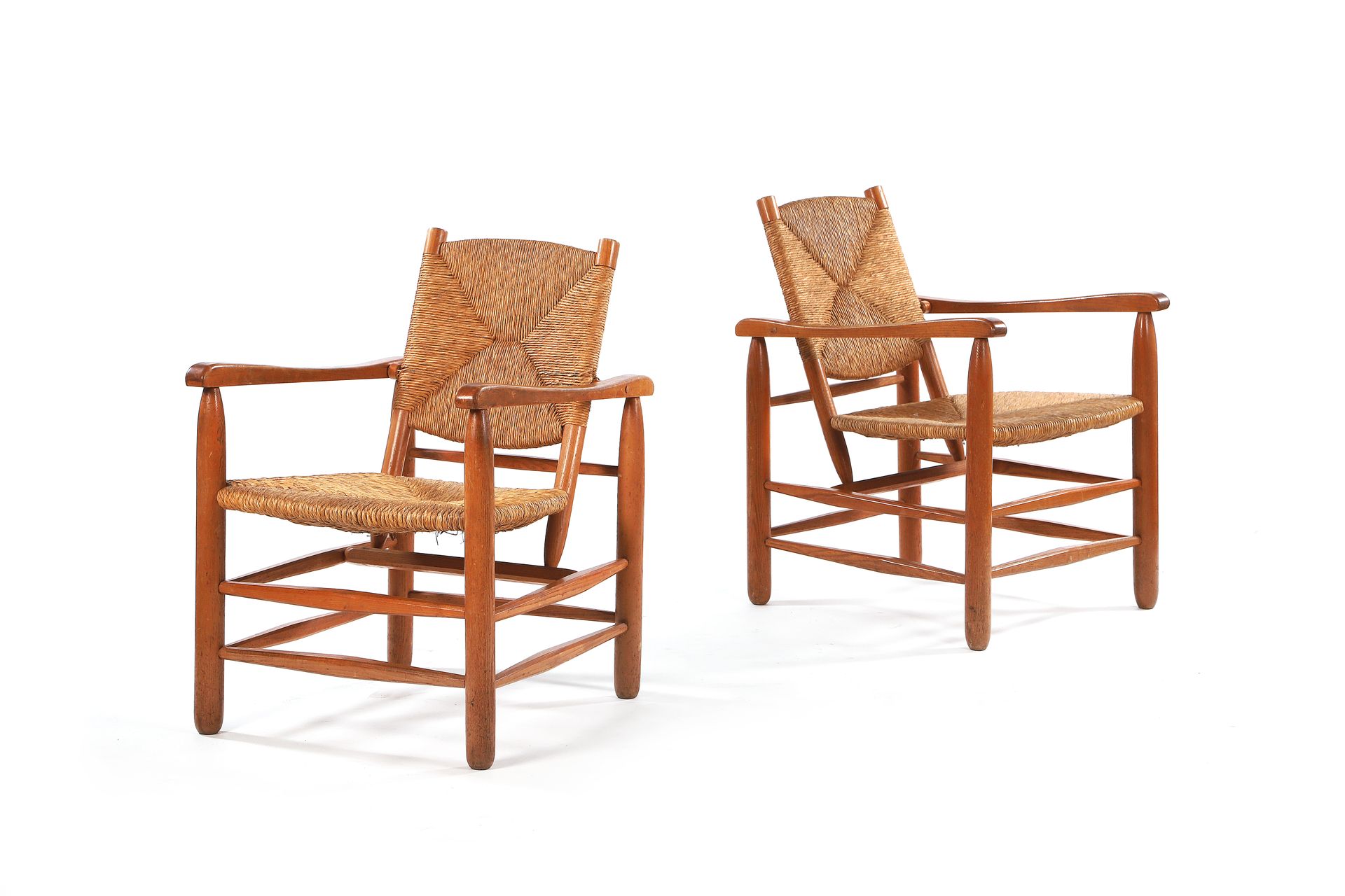 Null Charlotte PERRIAND (1903-1999) 

Pair of armchairs n°21 Oak, straw 78 x 68 &hellip;