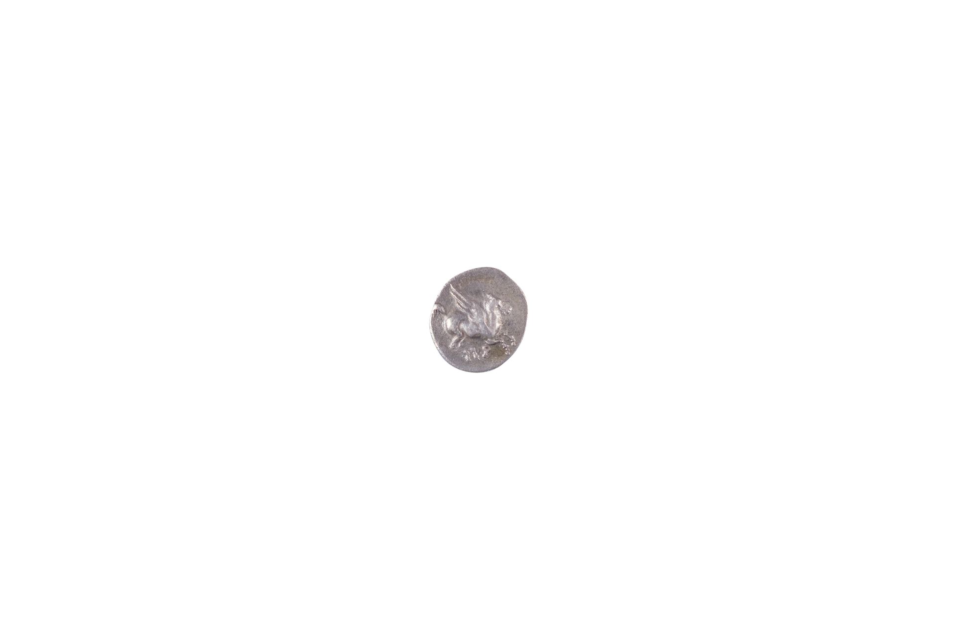 Null Corinto 400-243 a.C. Dracma d'argento. 2,26 gr. Pegaso a destra R/ Afrodite&hellip;