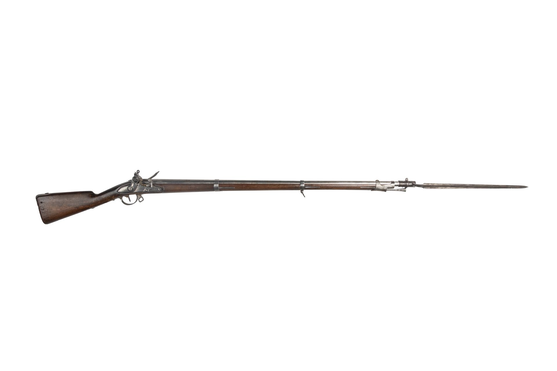 Null 1822年伏尔泰型号的燧发枪。

圆形枪管，有雷霆之怒，盖有印章。枪托上标有 "Mle 1822"。锁 "Mre Rle de Sainte Etie&hellip;