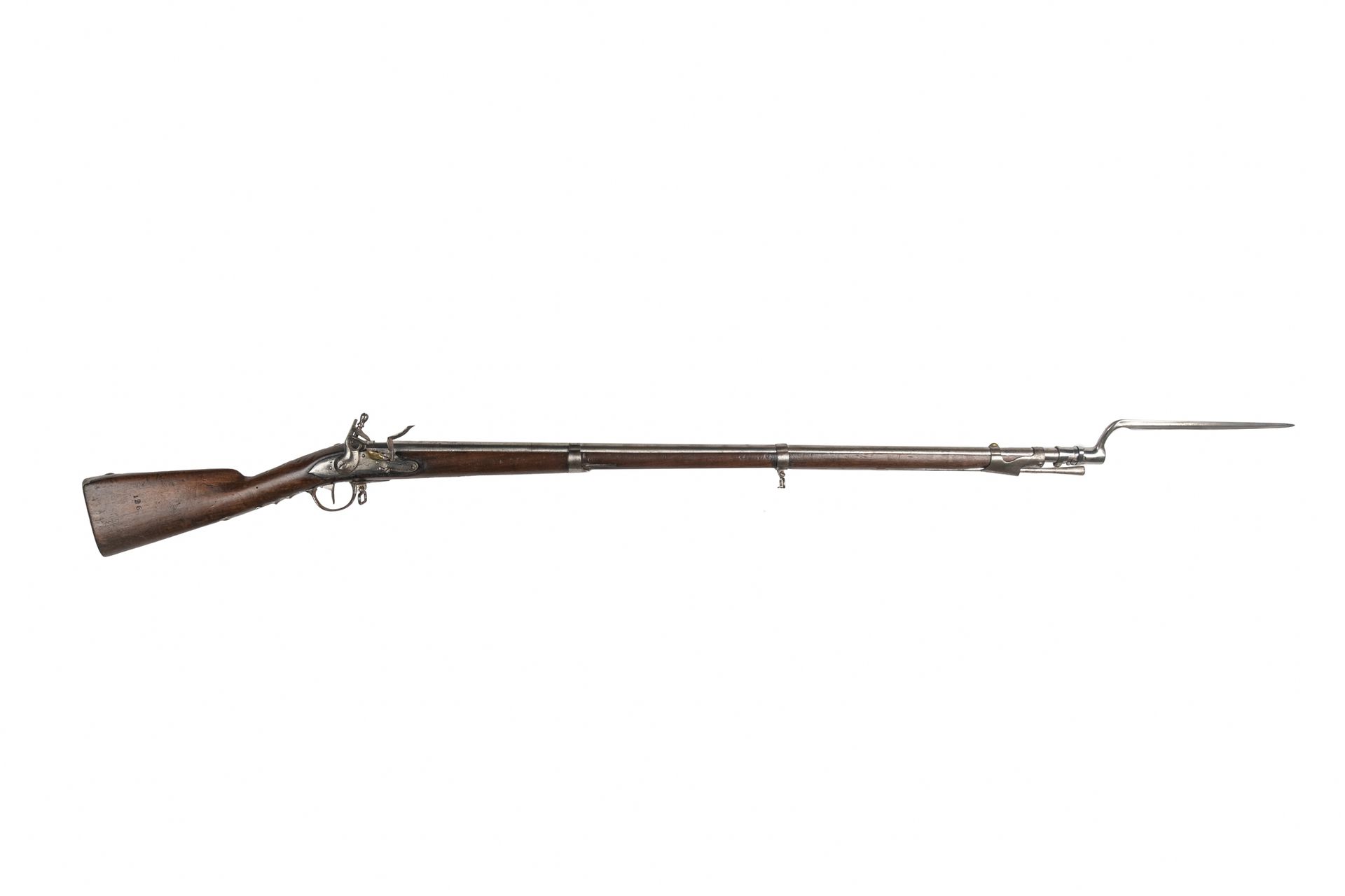 Null 1777型士官生的燧发枪。

圆形枪管，有平头。圆形锁体上刻有 "St Etienne 80 "并盖有印章。螺丝口和铁配件。匾额 "SQ "和十字花饰&hellip;