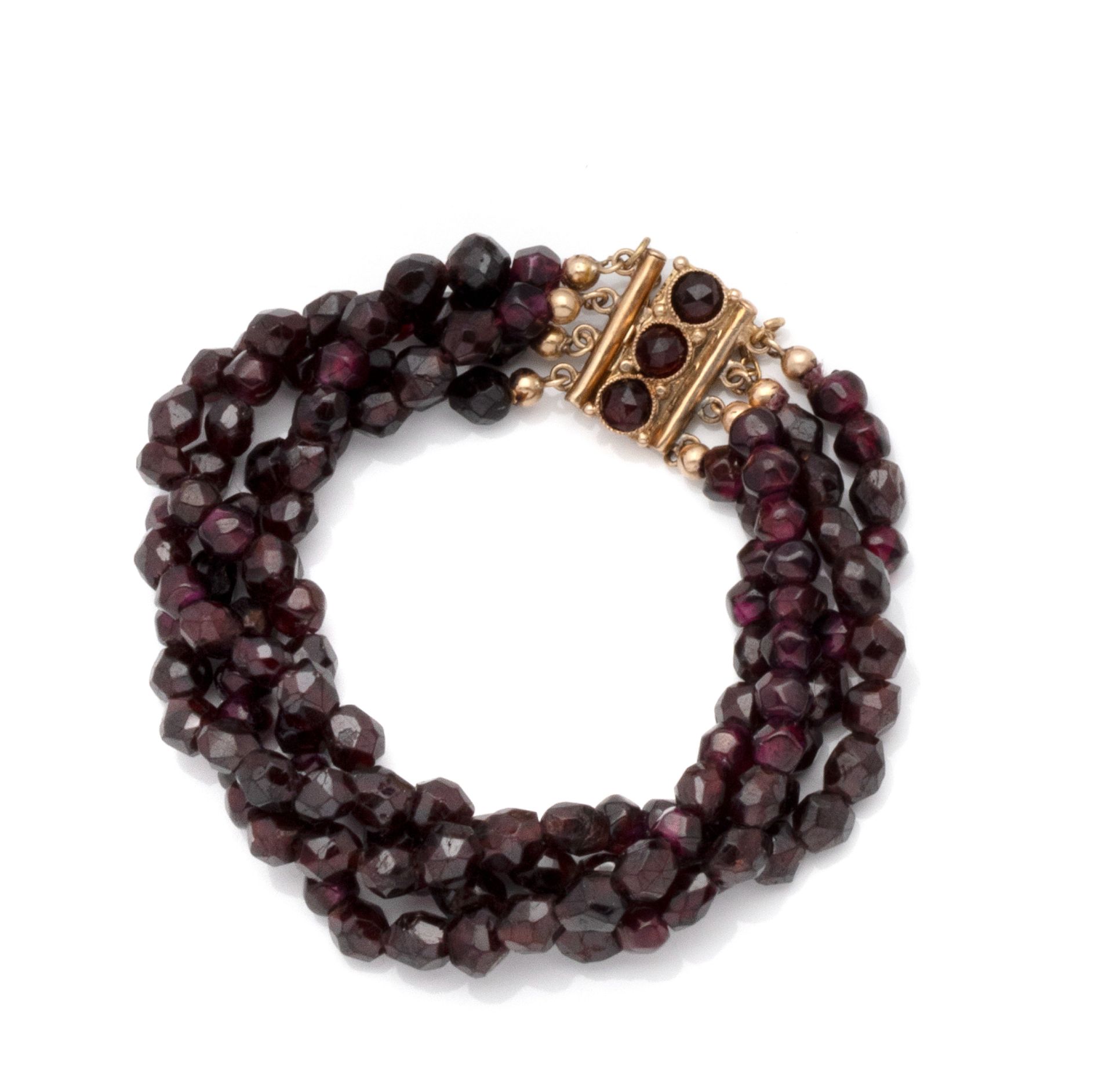 Null Bracelet composed of four rows of faceted garnet beads terminated by gold b&hellip;