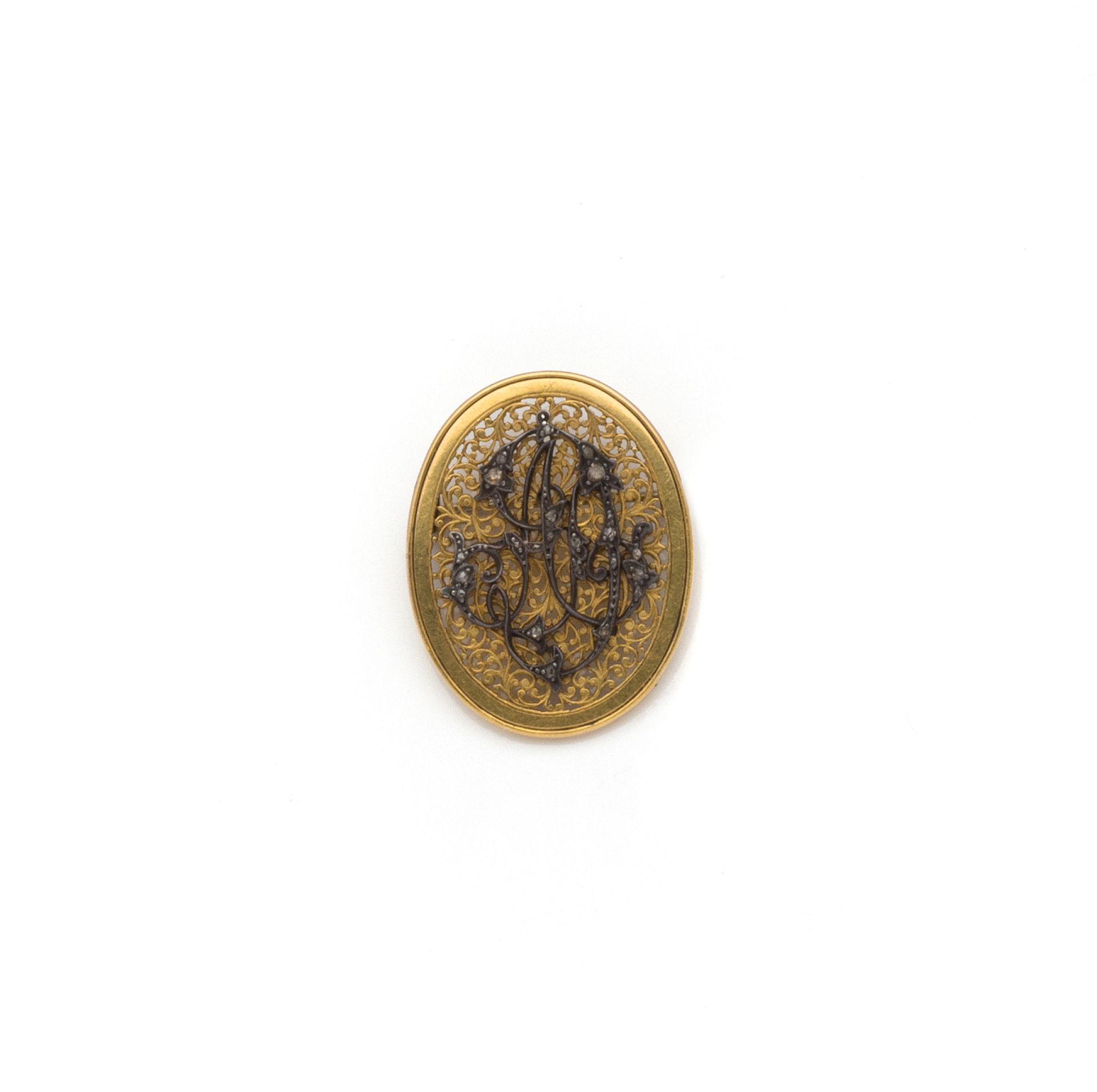 Null Ovale Brosche aus 18 Karat Gelbgold (750/1000) und Silber (800/1000) mit de&hellip;