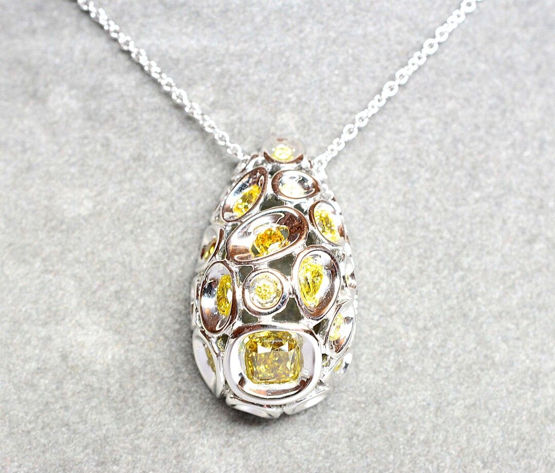 Null White gold pendant set with 20 NATURAL yellow and orange diamonds, oval, cu&hellip;