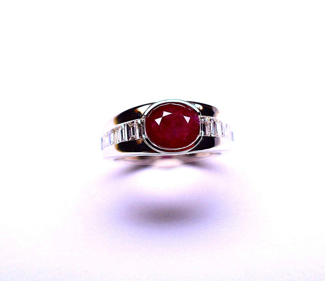 Null Ring "façon Mauboussin" centered by a NATURAL BIRMAN ruby of good quality w&hellip;