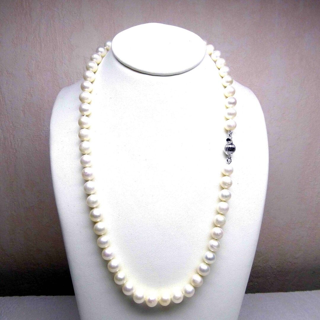 Null 天然养殖珍珠项链，直径7-7.5毫米，长42厘米-银扣

(每颗珍珠之间打一个结)