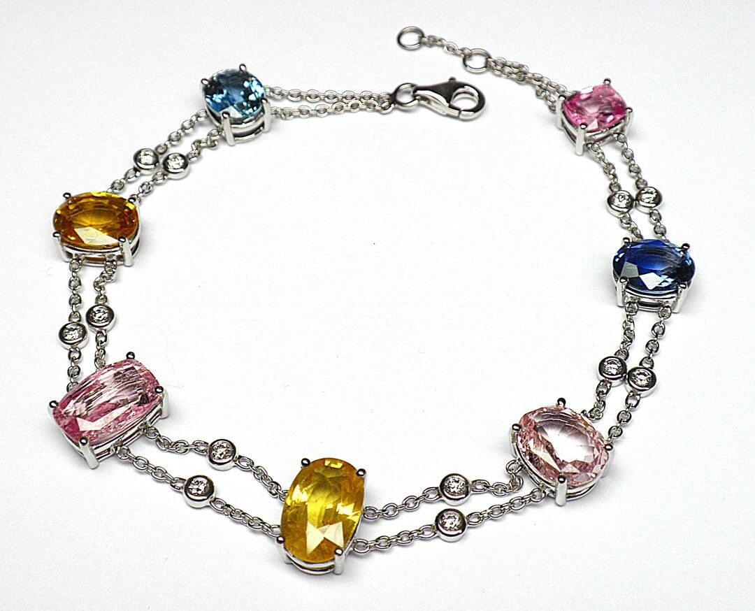 Null Charming white gold bracelet set with seven multicolored Ceylon sapphires o&hellip;