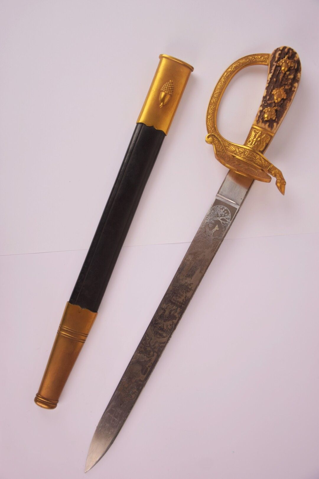 Null SOLINGEN

Dagger of venery with guard out of gilded bronze with a branch de&hellip;