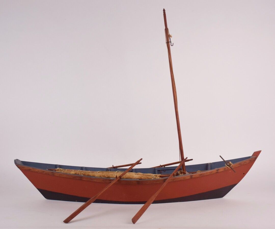 Null Modell eines Dorys aus polychromem Holz

Länge : 98 cm